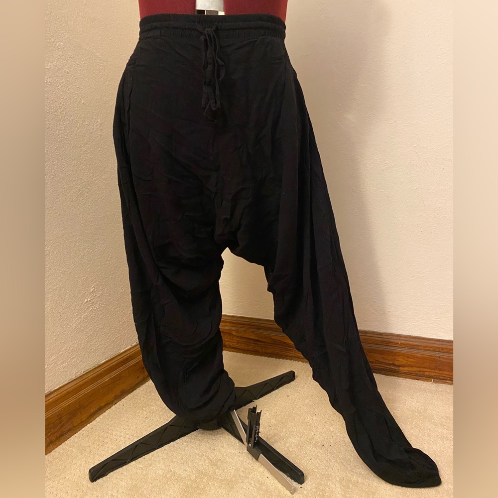 Buddha pants, black, cotton, dropped crotch, pockets, tie waist. Size L 10/12.